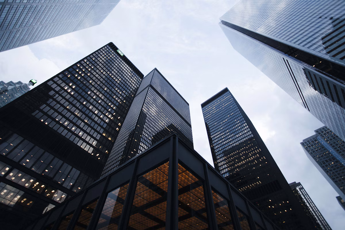 Modern glass office buildings representing business and technology